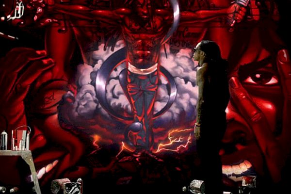 Lil Wayne, Bruno Mars Reflect Red + Black vo videu „Mirror“.